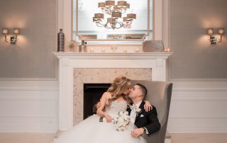 bride groom near brooklake fireplace