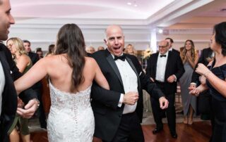 A couple gracefully dancing at one of the outdoor wedding venues in NJ for their wedding reception