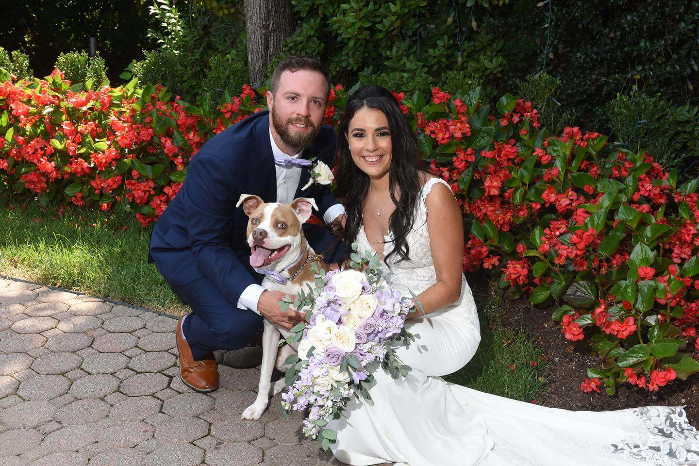 Brooklake Wedding Couple with Dog A bride and groom pose for a photo with their dog at one of the sought-after Florham Park wedding venues in New Jersey.