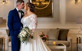 bride and groom steal a kiss private moment wedding at brooklake